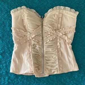 Bebe Ruched Sweetheart neckline front zip corset in Cream